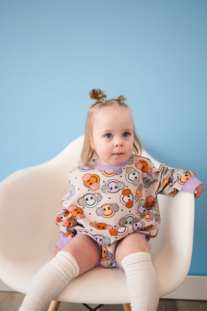 Addie Joy Company Oversized Cozy Romper - Fuzzy Smiley